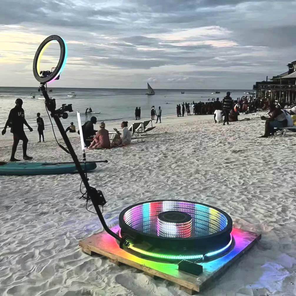 spinning photo booth outside at the beach